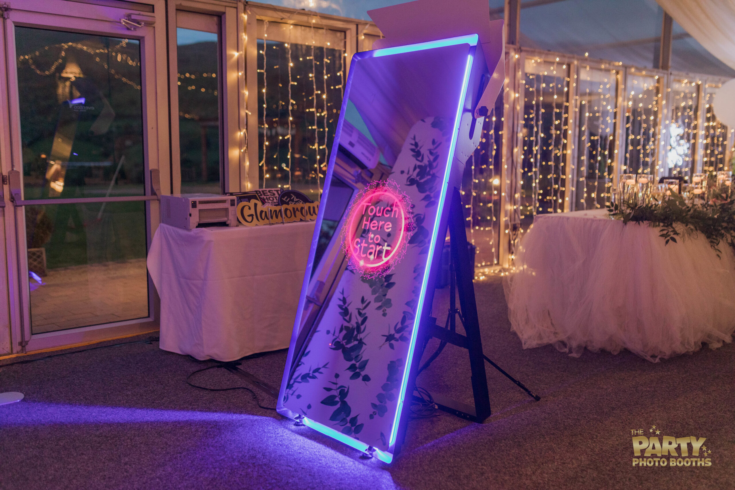 The Mirror Air at a wedding, party or prom just waiting on guests to touch to start having their photos taken